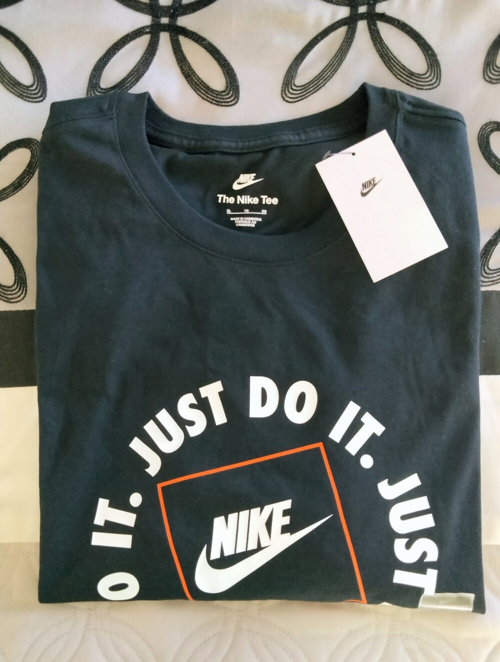 Nike Men’s Black Graphic Short-Sleeve Tee with White & Orange Logo